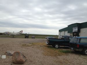gas stop with Military Museum and a fighter jet